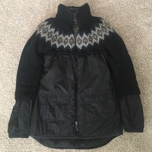 Prada black outerwear made in Italy.